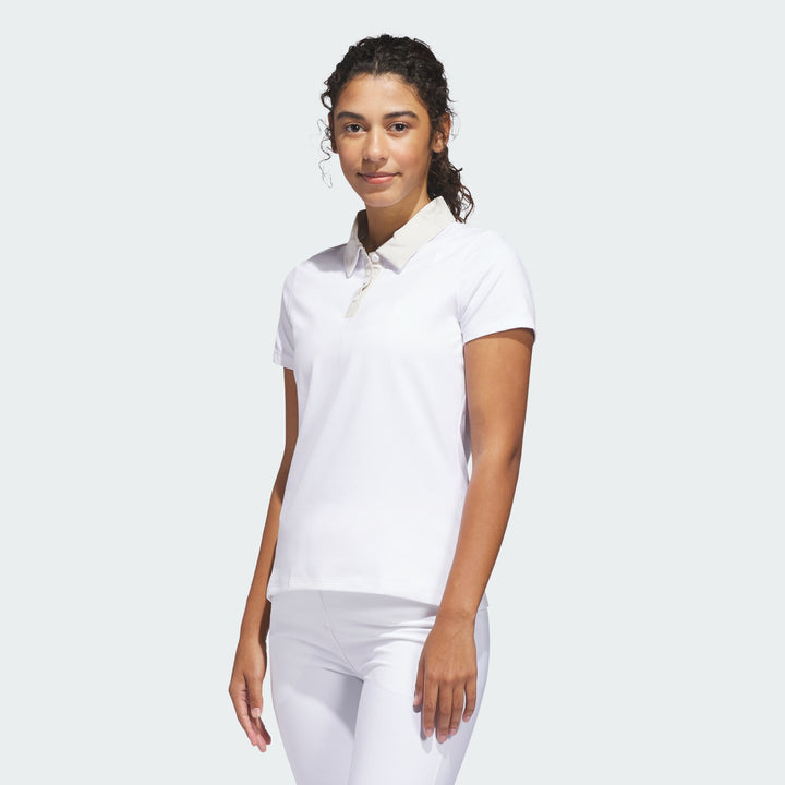 adidas Women's Ultimate365+ Butterspun Grid Polo Shirt - Beige - model front view