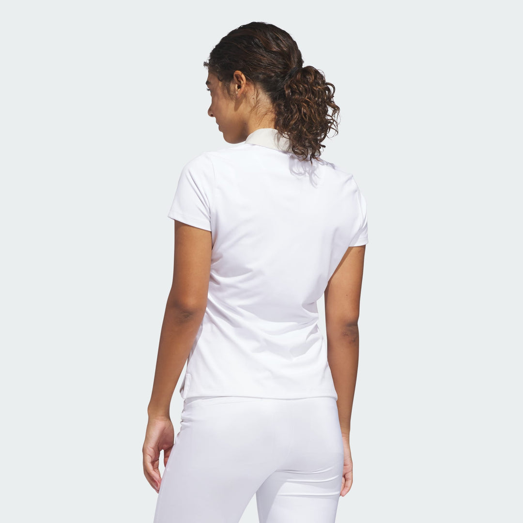 adidas Women's Ultimate365+ Butterspun Grid Polo Shirt - Beige - model side view